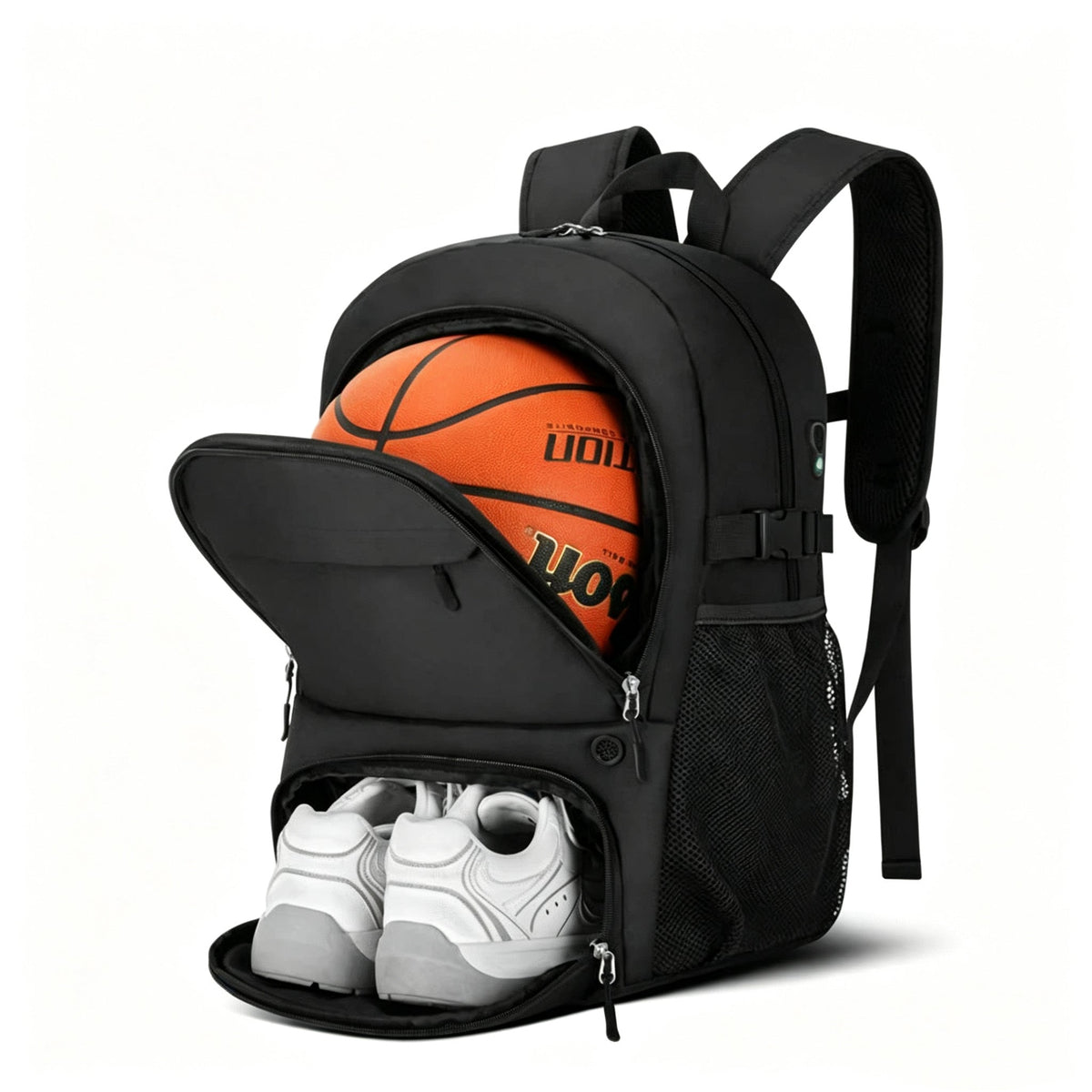 A black backpack shown open on a white background, with an orange basketball in the upper compartment and a pair of white and gray sneakers in the lower compartment.