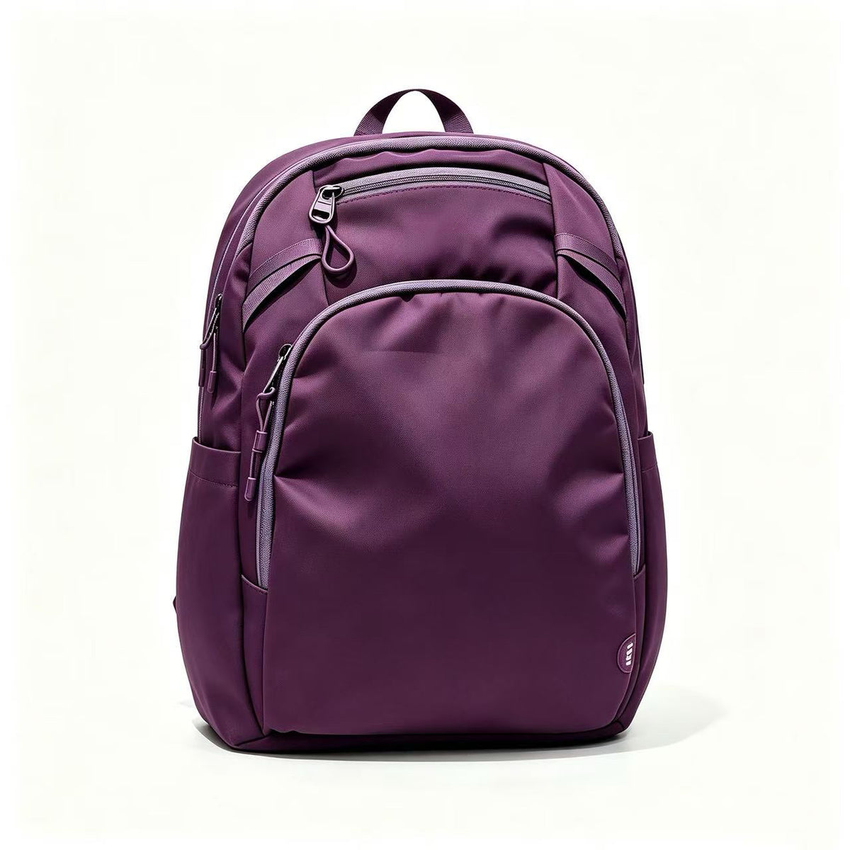 A purple backpack with multiple zippered compartments and a white stylized 'P' logo on the front, photographed against a clean white background.